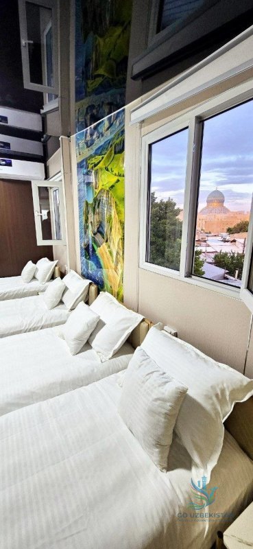 Quad room with a private bathroom, air conditioning, and Wi-Fi — photo 4