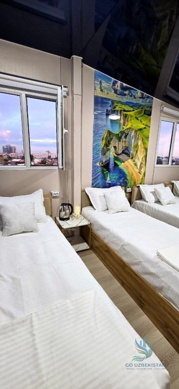 Quad room with a private bathroom, air conditioning, and Wi-Fi — photo 1